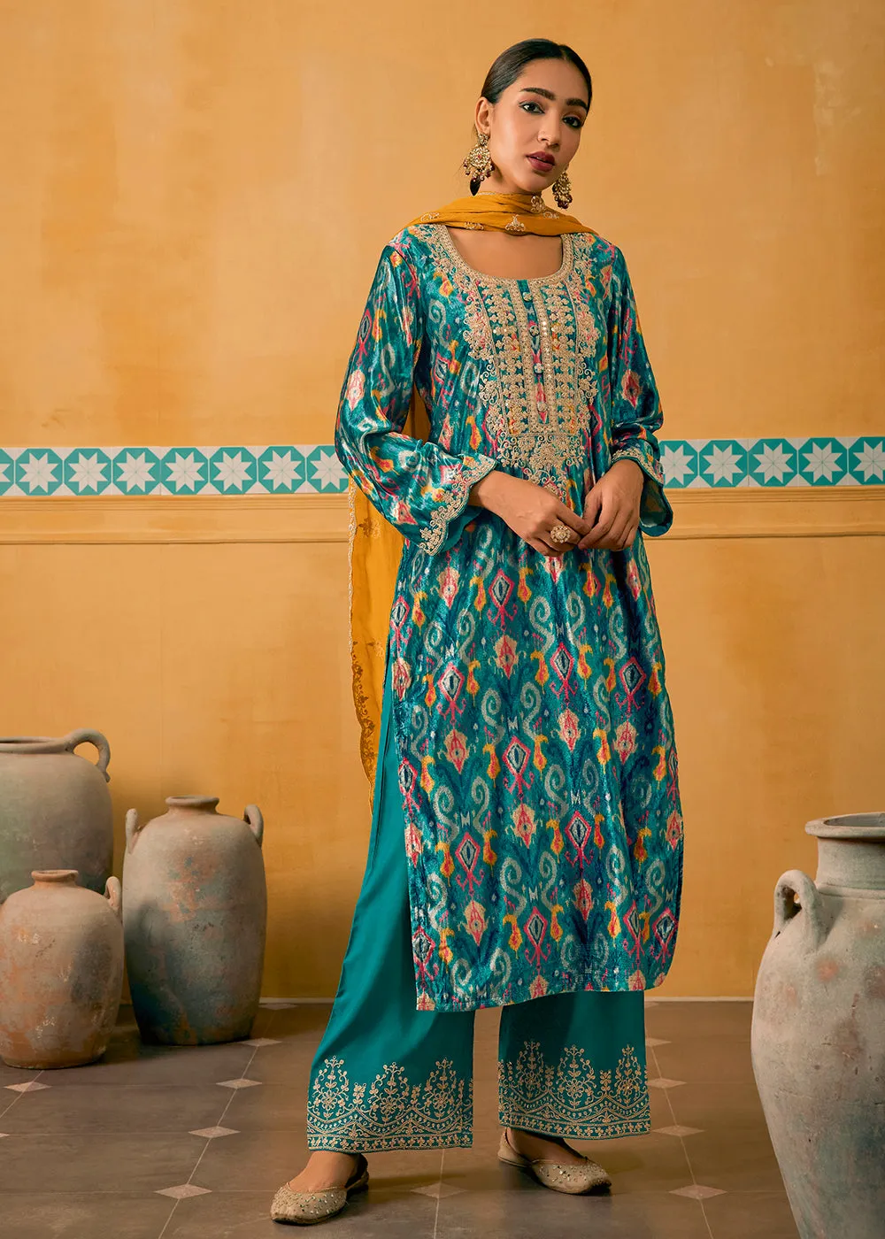 Turquoise Multicolor Digital Printed Embroidered Velvet Salwar Suit